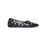 The Freda Salvador Jessie Ballet Flat is a black shoe made from Italian leather, featuring large, round silver studs against a plain white background. The shoe's minimalist design is complemented by the metallic embellishments, resulting in a modern and stylish look.