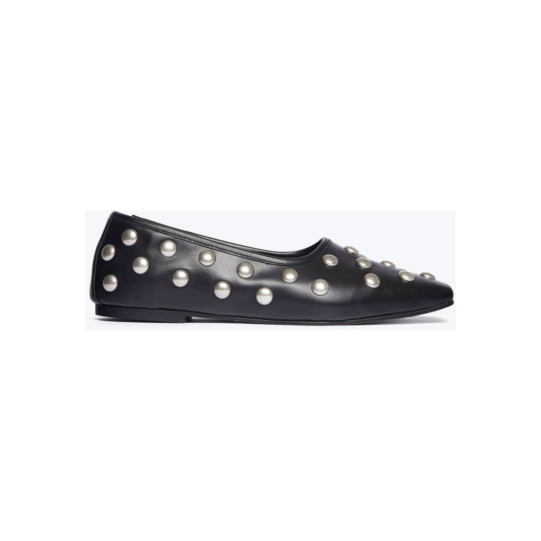 The Freda Salvador Jessie Ballet Flat is a black shoe made from Italian leather, featuring large, round silver studs against a plain white background. The shoe's minimalist design is complemented by the metallic embellishments, resulting in a modern and stylish look.
